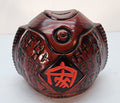 Hand-carved wooden piggy bank