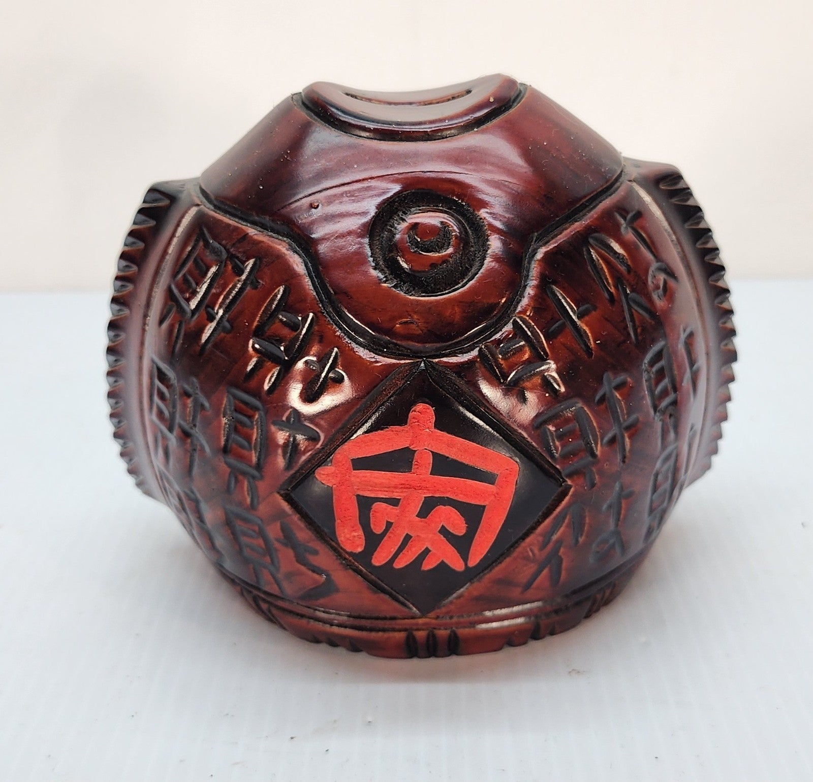 Hand-carved wooden piggy bank